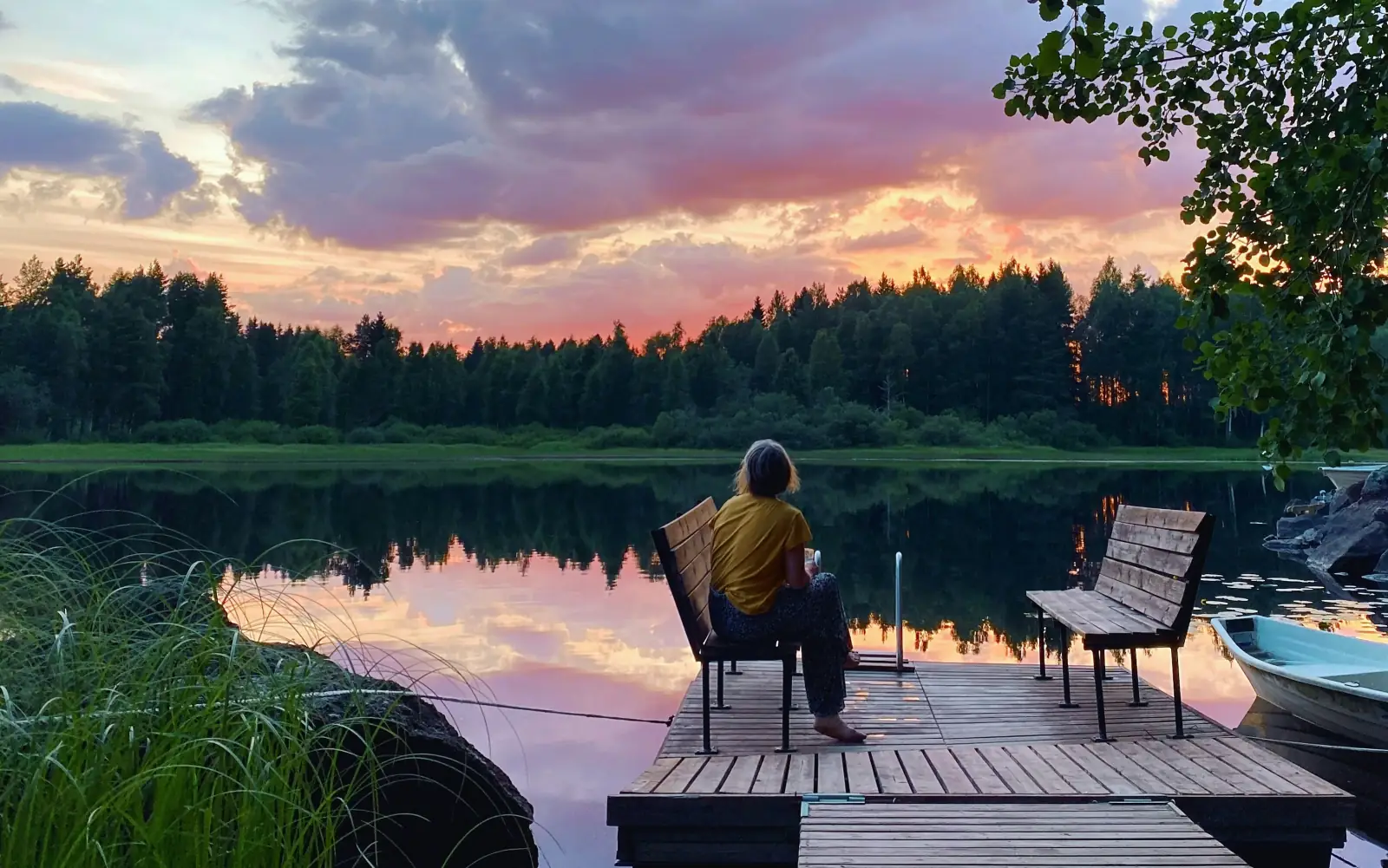 A calm summer evening on a dock by a lake